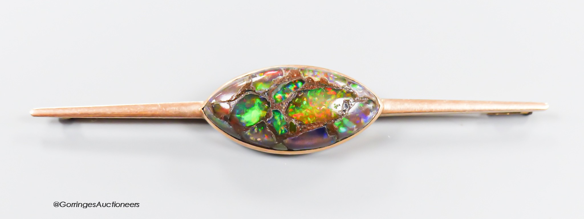 A yellow metal and navette shape opal doublet? set bar brooch, 86mm, gross weight 10.3 grams.